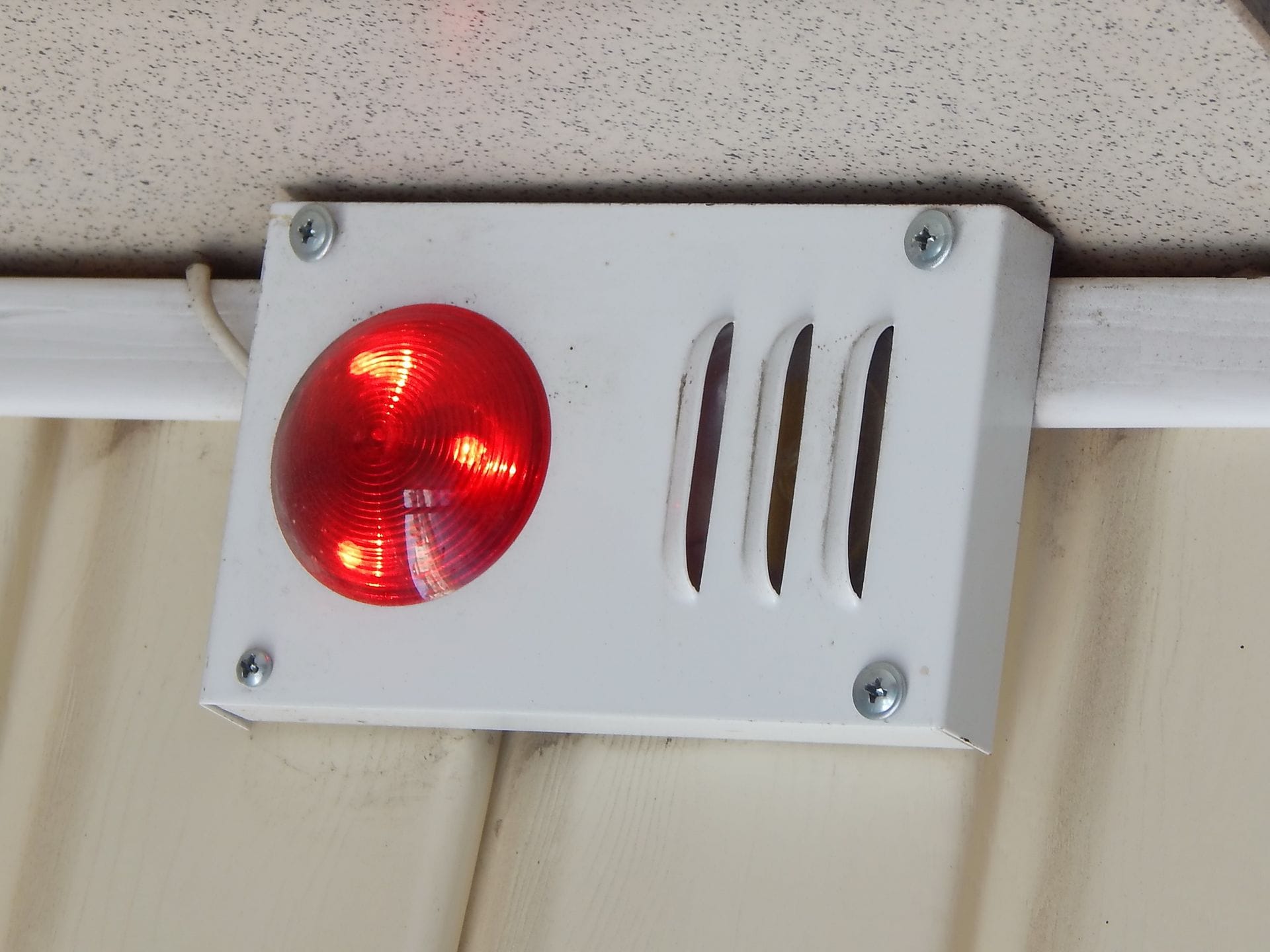 External alarm siren and strobe on a building